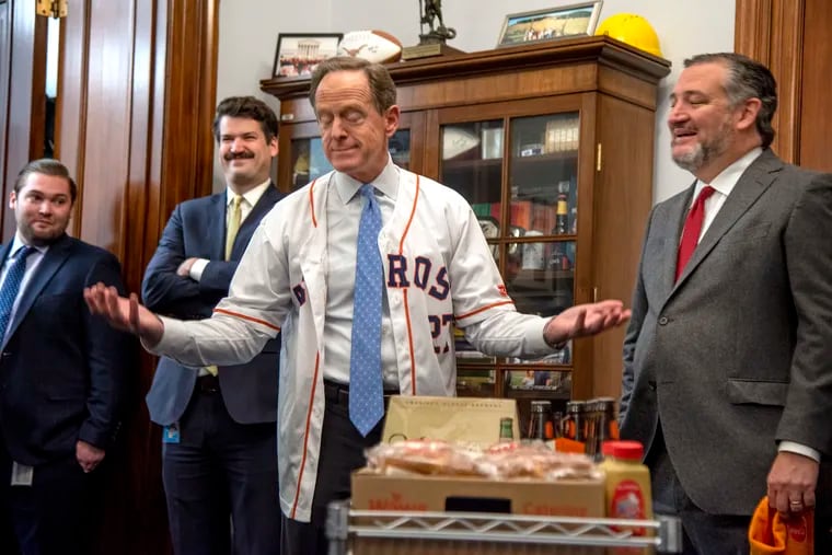 Making good on a wager he made before the World Series, Sen. Pat Toomey (R., Pa.) delivers Wawa soft pretzels and beer from Yuengling and Yards to Sen. Ted Cruz (R. Texas). in Washington, D.C. Thursday, Nov. 17, 2022, all while wearing a José Altuve jersey. (IF the Phillies HAD defeated the Houston Astros, Cruz promised pecan pie, ice cream, and St. Arnold beer to Toomey and his staff - while wearing a Phillies jersey).