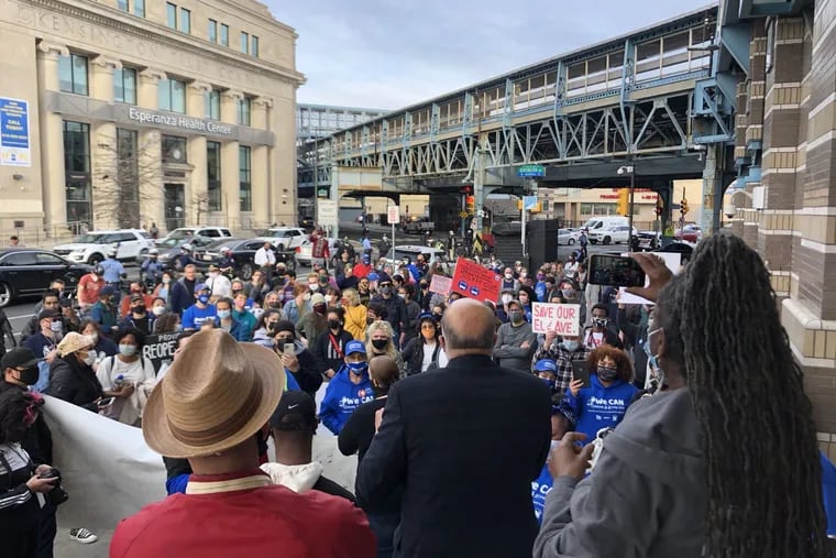 City Councilman Mark Squilla (blue suit) addressing a rally of Kensington residents at the Allegheny El Station. Residents were protesting SEPTA's decision to close the Somerset Station for an extended period to make repairs and improve safety.