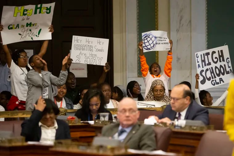 Students and supporters of Global Leadership Academy Charter School protest inside City Council Chambers to deliver a message to the Board of Education on Thursday, May 23, 2019. Some Philadelphia charter school leaders are accusing the Philadelphia School District of targeting black-led charter schools for closure.