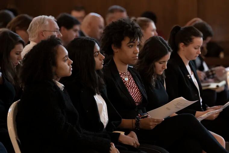 Students in the front row listen to Temple University President Richard M. Englert address the Marc Lamont Hill scandal during a Board of Trustees last December.