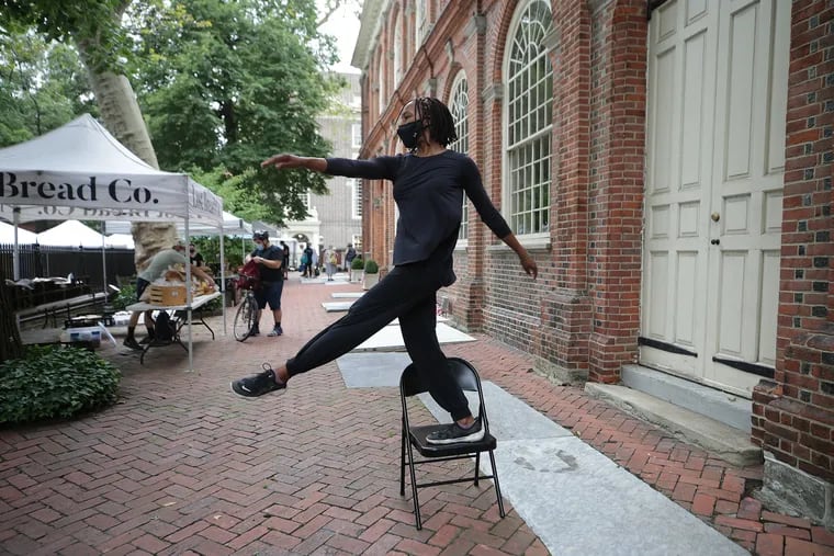 Dancer Shayla-Vie Jenkins performs at the Christ Church Neighborhood House Farmer’s Market on Sept. 2. Jenkins and other dancers were previewing the virtual dance piece “The Philadelphia Matter 1972-2020,” one of the shows in the Philadelphia Fringe Festival.