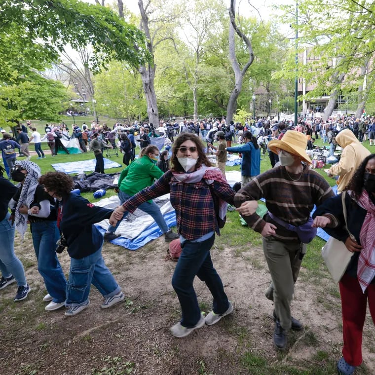 Students protest as a camp is set up on Penn’s campus in Philadelphia on Thursday, April 25, 2024.