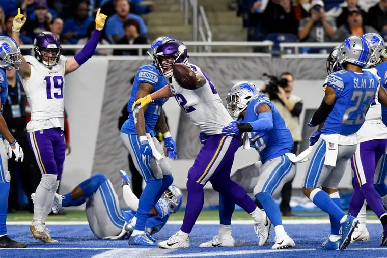 Minnesota Vikings tight end Kyle Rudolph reacts after his 44-yard reception for a touchdown during the first half of an NFL football game, against the Detroit Lions Sunday, Dec. 23, 2018, in Detroit. (AP Photo/Jose Juarez)