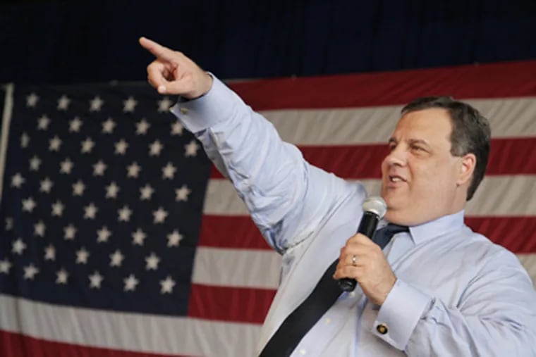 New Jersey Gov. Chris Christie jokes with a member of a large gathering at a town hall meeting in East Hanover, N.J., Wednesday, May 16, 2012. (AP Photo/Mel Evans)