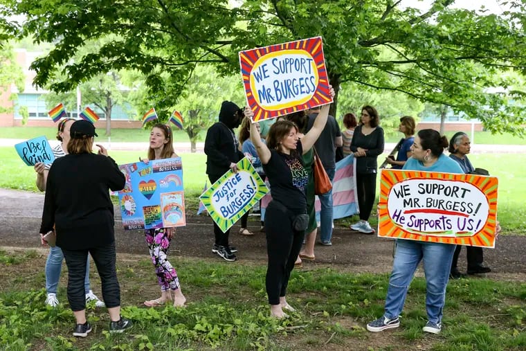 Parents support students protesting outside Lenape Middle School over the suspension of teacher Andrew Burgess in May 2022.