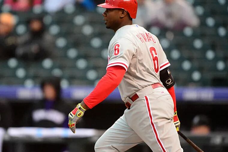 Philadelphia Phillies first baseman Ryan Howard (6) singles in the first inning against the Colorado Rockies at Coors Field. (Ron Chenoy/USA Today)
