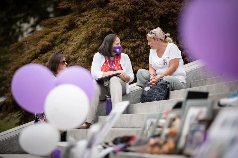 Susan Ousterman (right) speaking to Jennifer Smith, the secretary of the Department of Drug and Alcohol Programs, during an overdose awareness event at the Pennsylvania Capitol on Aug. 31, 2021. Ousterman has spearheaded the creation of a pop-up memorial garden for overdose victims in Philadelphia; her son, Tyler Cordeiro, died of an overdose in October 2020.