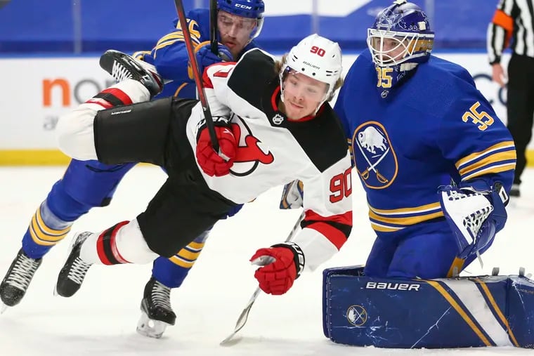 He might not score a lot, but Rasmus Ristolainen (left) will clear the front of the net, as he's doing here on New Jersey Devils forward Jesper Boqvist.