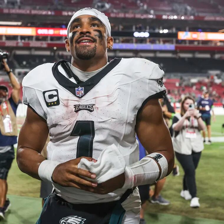 Philadelphia Eagles quarterback Jalen Hurts looks up at fans after a win against the Tampa Bay Buccaneers in Tampa, Fla., on Monday, Sept. 25, 2023.