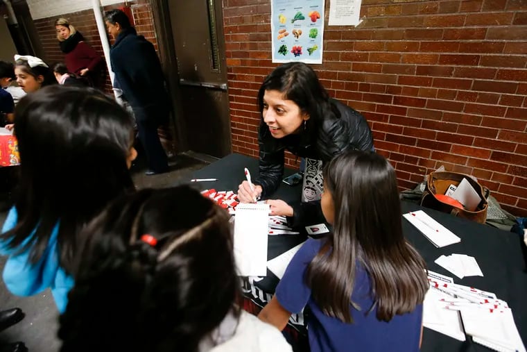 Columnist Helen Ubinas talks to Southwark School students on Thursday, December 6, 2018.  The  @NotesFromHel Pop-Up Newsroom is an experiment in community outreach and collaboration.