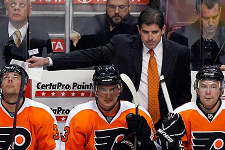 Peter Laviolette and the Flyers have won four straight games. (Yong Kim/Staff Photographer)