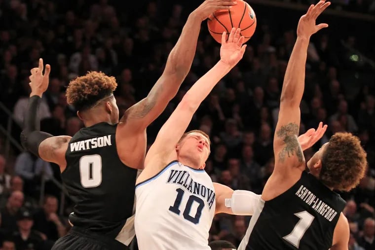 It was this kind of game all night as Donte DiVincenzo runs into traffic against Providence.