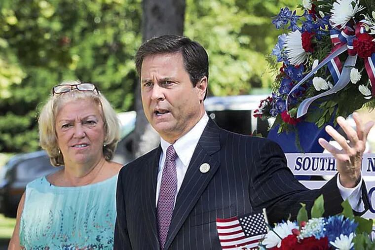 At right is NJ State Senator Donald Norcross along with Sue Michielli, AFL-CIO during wreath ceremony. Labor Day Observance at Peter J. McGuire Memorial at Arlington Cemetery in Pennsauken, NJ on Friday, August 29, 2014. ( ALEJANDRO A. ALVAREZ / STAFF PHOTOGRAPHER )