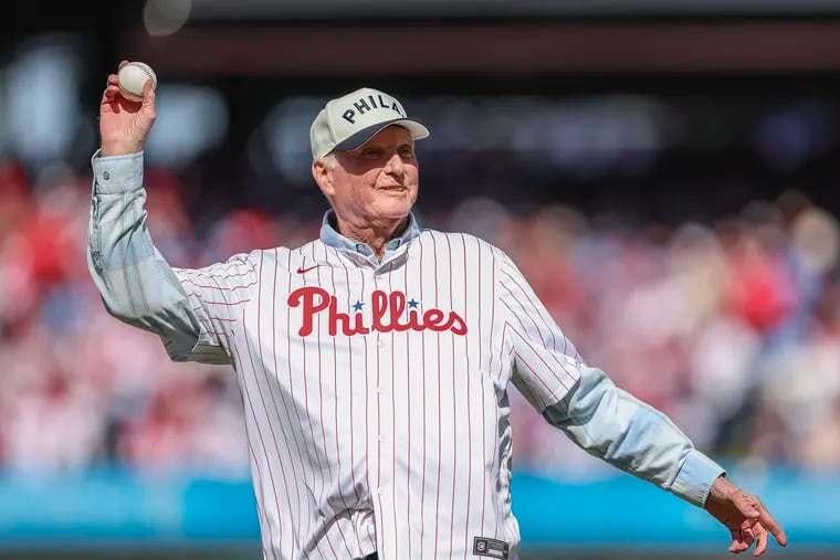 Phillies former manager Charlie Manuel, shown throwing the first pitch on opening day, is one of 20 big leaguers to invest in Perfect Game.