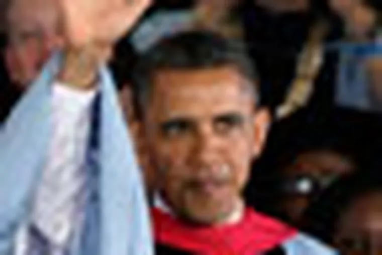 President Barack Obama acknowledges applause after delivering the commencement address to graduates at all-female Barnard College, on the campus of Columbia University, in New York,  Monday, May 14, 2012. Barnard was the first college in New York City where women could receive the same liberal arts education available to men. (AP Photo/Richard Drew)