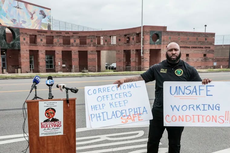 David Robinson, president of Local 159 of AFSCME District Council 33, the correctional officers union, gets ready to speak with the media in front of the Philadelphia Industrial Correctional Center. The union has taken a 'no confidence' vote against city Prisons Commissioner Blanche Carney.