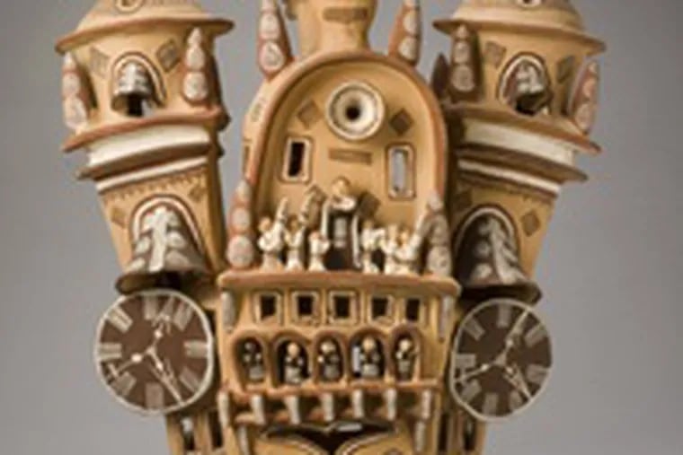 &quot;Roof-top Church,&quot; painted earthenware, artist unknown, an example of the proficiency in clay that is displayed by Mexican folk artists. Of the 95 objects in the exhibition, most are from Mexico.