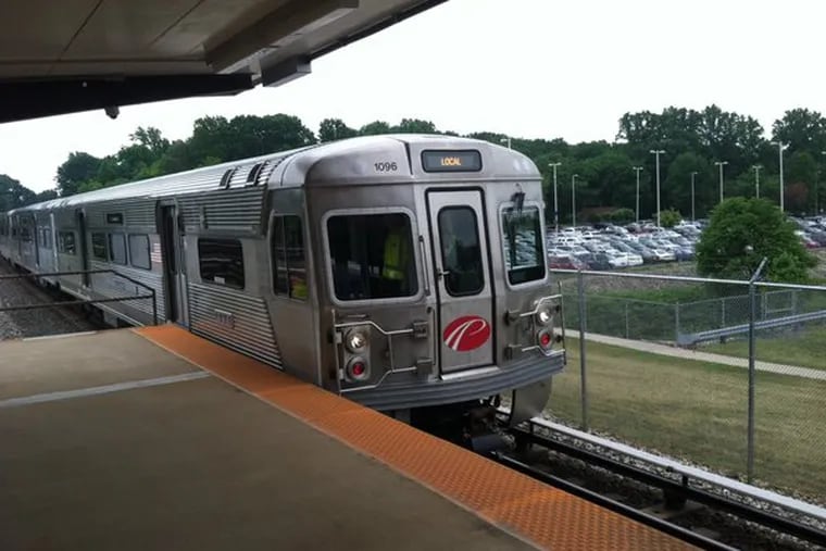 A PATCO train at the Woodcrest Station en route to Philadelphia.