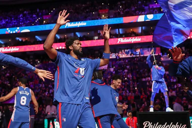 Sixers center Joel Embiid is introduced before the start of a game against the Detroit Pistons on Dec. 21.