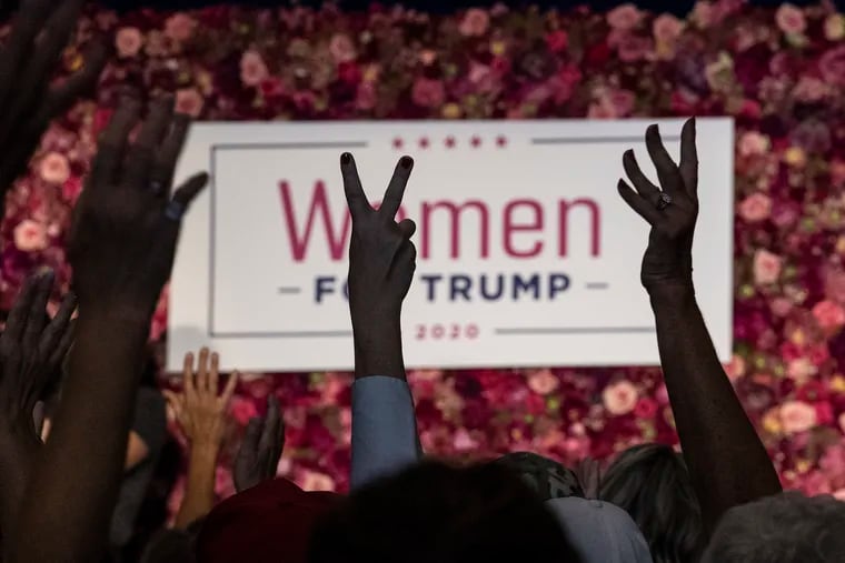Women cheer during the national kick off of the Trump campaign's Women For Trump coalition rally at the Valley Forge Casino Resort in King of Prussia.