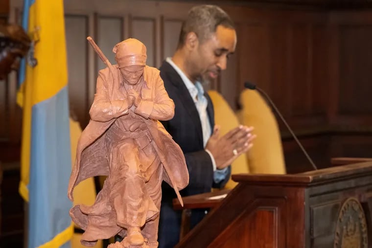Artist Alvin Pettit speaks in October at the unveiling of his winning sculpture design of Harriet Tubman. When completed, the statue will stand outside City Hall.