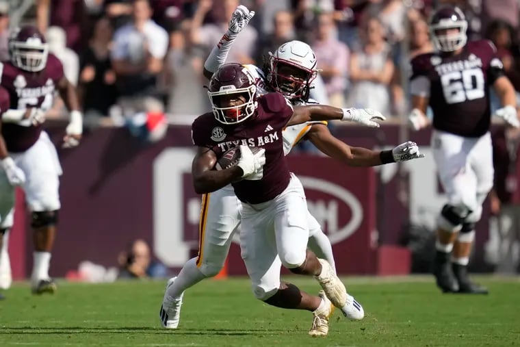 Texas A&M wide receiver Ainias Smith (0) breaks free from Louisiana Monroe safety AJ Watts (16) for a 23-yard run during the first half of an NCAA college football game Saturday, Sept. 16, 2023, in College Station, Texas. (AP Photo/Sam Craft)