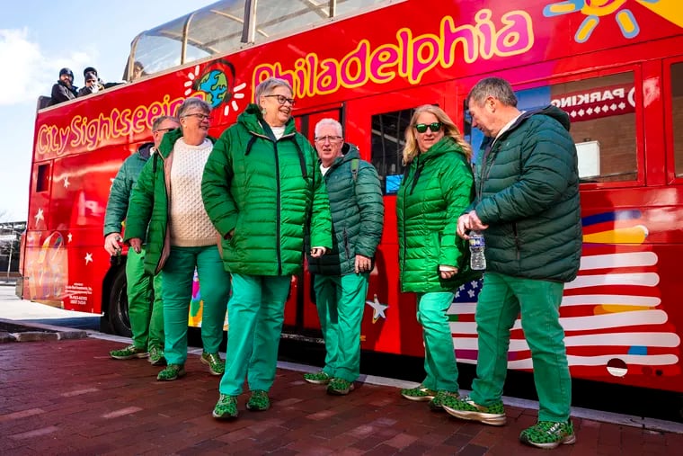 March 18, 2024: Friends from Iowa pause before boarding a tourist bus on Independence Mall. From left are Dan and Diane Sperfslage, of Aurora; Dianne and Mike Loughren, of Hazleton; and Becky and Doug Lindsay, of Masonville.