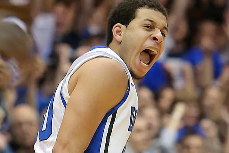 Duke's Seth Curry, who scored a game-high 31 points against Santa Clara, celebrates a 3-pointer during the second half of an NCAA college basketball game in Durham, N.C., Saturday, Dec. 29, 2012. Duke won 90-77. (Ted Richardson/AP)