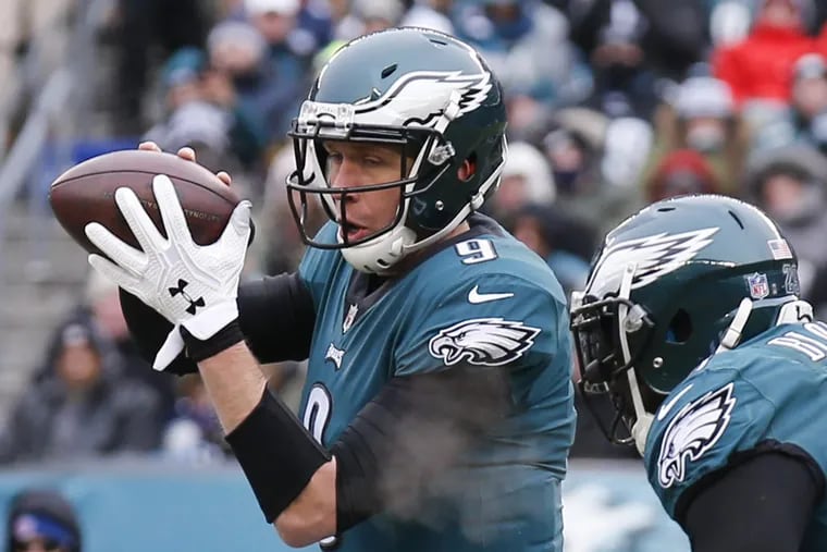 Eagles quarterback Nick Foles takes the snap with running back LeGarrette Blount to his left in Sunday’s 6-0 loss to Dallas.