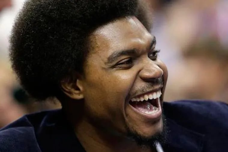 Andrew Bynum laughing during a game in November. (Matt Slocum/AP file)
