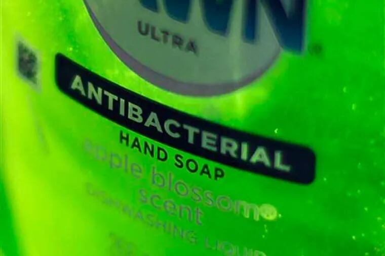 This Tuesday, April 30, 2013, photo, shows Dawn Ultra antibacterial soap in a kitchen Tuesday in Chicago. Federal health regulators are deciding whether triclosan, the germ-killing ingredient found in an estimated 75 percent of anti-bacterial liquid soaps and body washes sold in the U.S. is harmful. The ruling, which will determine whether triclosan continues to be used in household cleaners, could have broader implications for a $1 billion industry that includes hundreds of anti-bacterial products from toothpaste to toys (AP Photo/Kiichiro Sato)