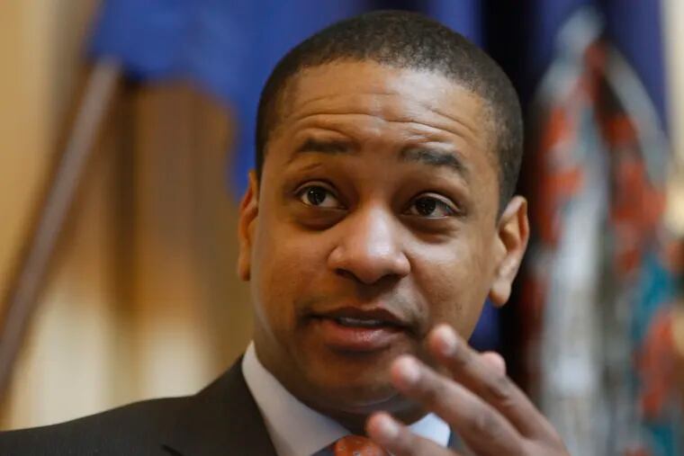 Virginia Lt. Gov. Justin Fairfax presides over the Senate session at the Capitol in Richmond, Va., Friday, Feb. 22, 2019. The chairman of the House Courts of Justice committee announced that they will hold a hearing on the sexual accusations that have been placed against Fairfax.