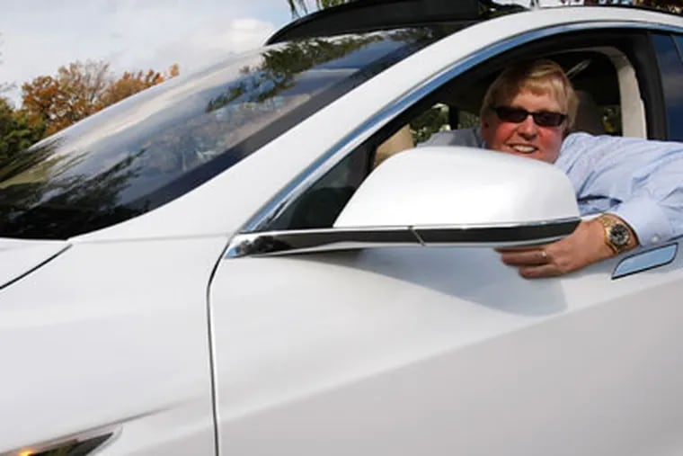 Peter Spirgel, an attorney with Flaster/Greenberg, behind the wheel of his new electric car, a Tesla Model S performance model. November 12, 2012. ( Michael S. Wirtz / Staff Photographer )