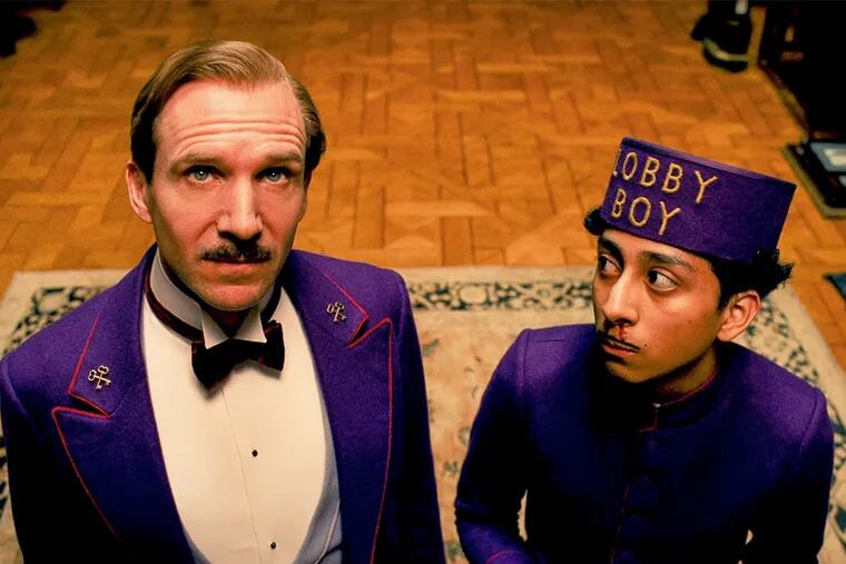 "The Grand Budapest Hotel" with Ralph Fiennes and Tony Revolori, directed by Wes Anderson: Screwball charm and melancholy.