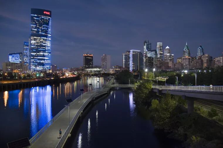 FILE PHOTO: The Philadelphia skyline seen from the South Street Bridge over the Schuylkill River includes the FMC Tower and Cira Centre South (left, foreground).