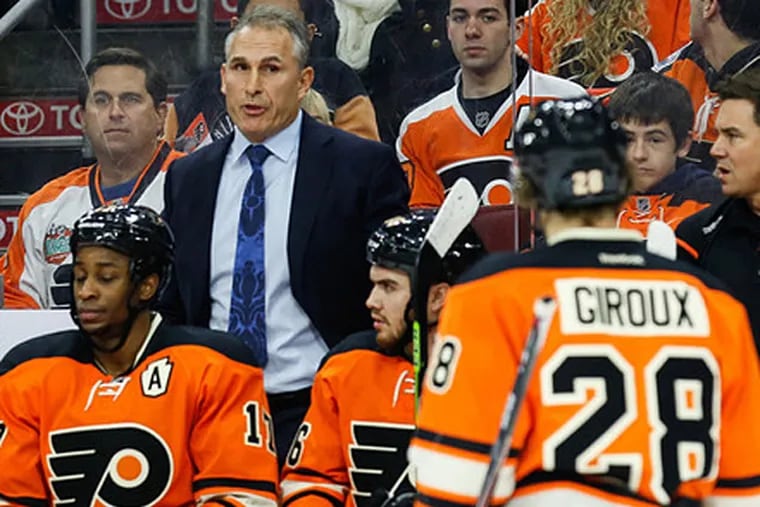 Philadelphia Flyers head coach Craig Berube talks in the direction of center Claude Giroux in a loss to the New York Rangers. (Bill Streicher/USA TODAY Sports)