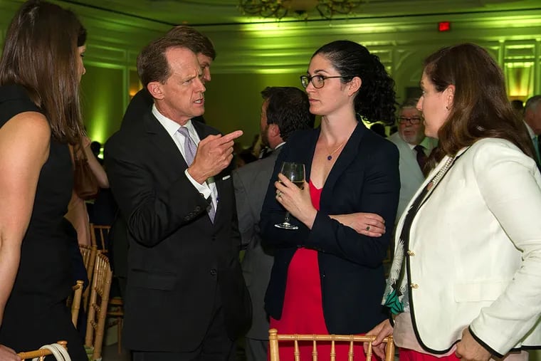 Sen. Pat Toomey speaks with supporters of the Sandy Hook Foundation at a gala in Washington. MARY F. CALVERT