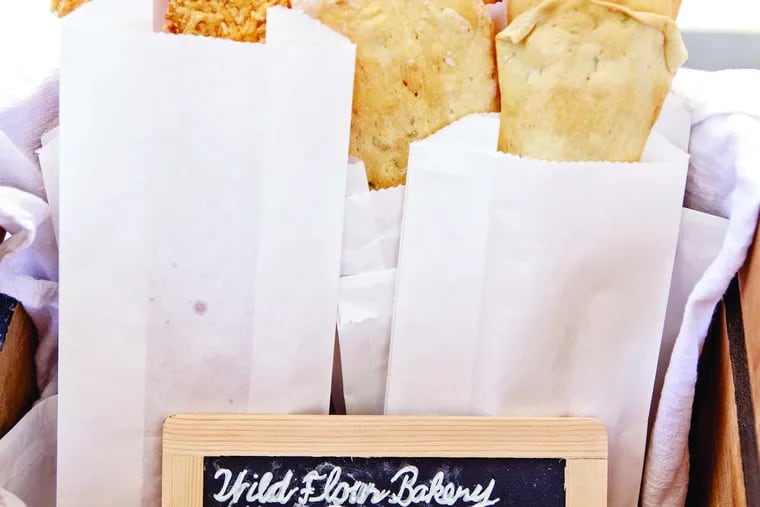 Flat bread offered for sale at the Wild Flour Bakery table is among the artisan items at the Dickinson Square market.