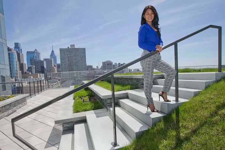 Melissa Lee at Cira Centre's rooftop park. Her GREEN Program is a travel company that exposes college students to renewable-energy facilities and the environment abroad.