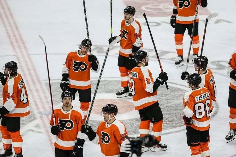 Flyers raise their sticks to thank them as their season ends  at the Wells Fargo Center on Friday, April 29.  Senators beat the Flyers 4-2.