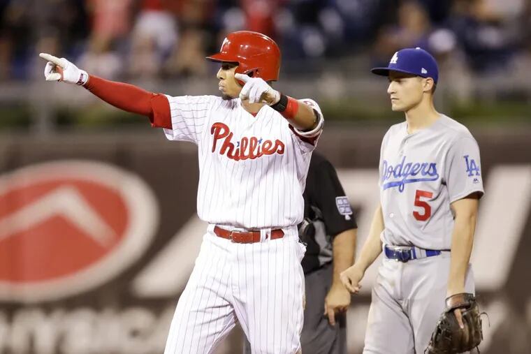 Phillies Aaron Altherr points after hitting a two-run double during the eighth inning against Los Angeles Dodgers.