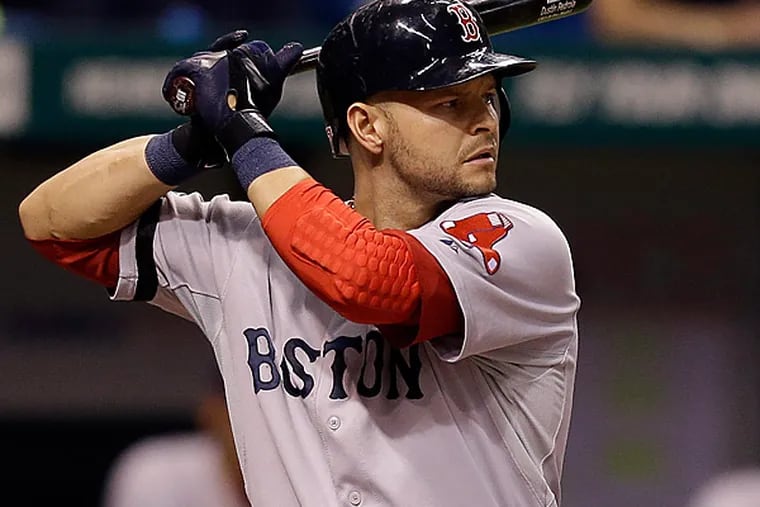 Cody Ross has reportedly reached a 3-year deal with the Diamondbacks. (Chris O'Meara/AP)