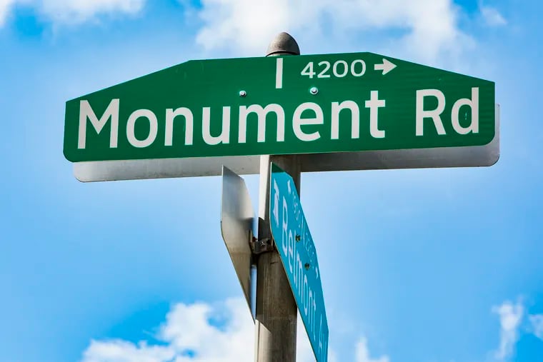 A sign for Monument Road in Philadelphia.