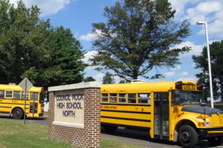 School buses leave Council Rock High School, where yesterday four students were taken to the hospital for reactions to Snurf, a hallucinogen widely available on the Internet.