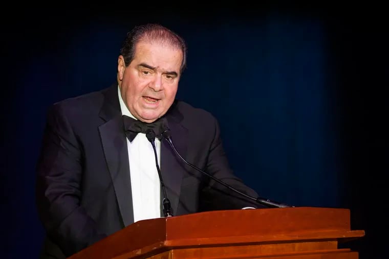 Supreme Court Justice Antonin Scalia speaks in Washington. President Donald Trump has visions of establishing by the final months of his second term—should he win one—a “National Garden of American Heroes” that will pay tribute to some of the prominent figures in the nation’s history, including Justice Scalia, that he sees as the “greatest Americans to ever live.” The president unveiled his plan Friday, July 3, 2020, during his speech at Mount Rushmore National Memorial, S.D.