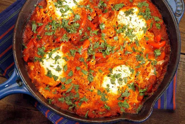 Shakshuka, a Middle Eastern dish, is essentially eggs cooked in a spicy tomato sauce, is beginning to see a gain in popularity in the United States. (Glenn Koenig/Los Angeles Times/MCT)