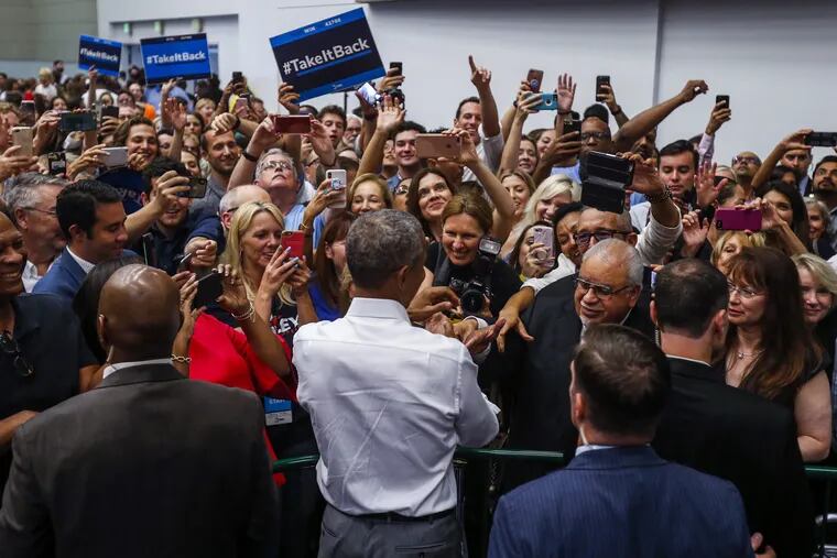 Former President Barack Obama greets supporters as he campaigns in support of California congressional candidates in Anaheim earlier this month.