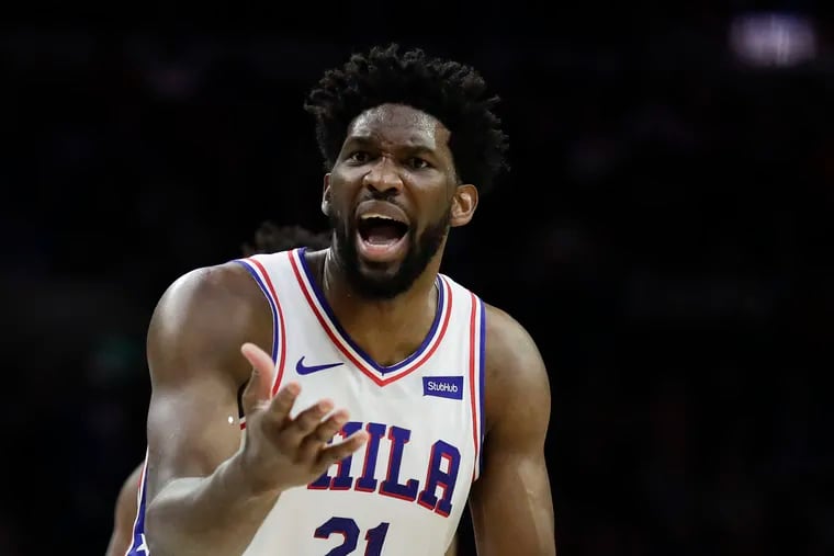 Joel Embiid argues a foul call during a December game.