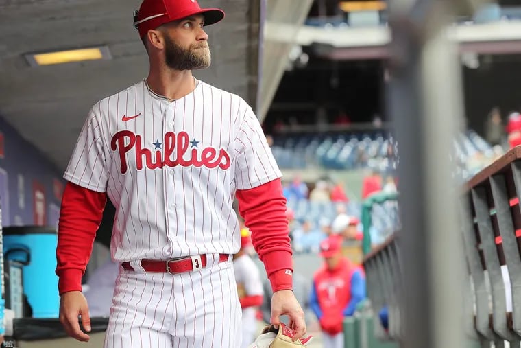Bryce Harper, who hasn't played in the field since April 16, says he's still trying to figure out the best way to be an everyday DH.