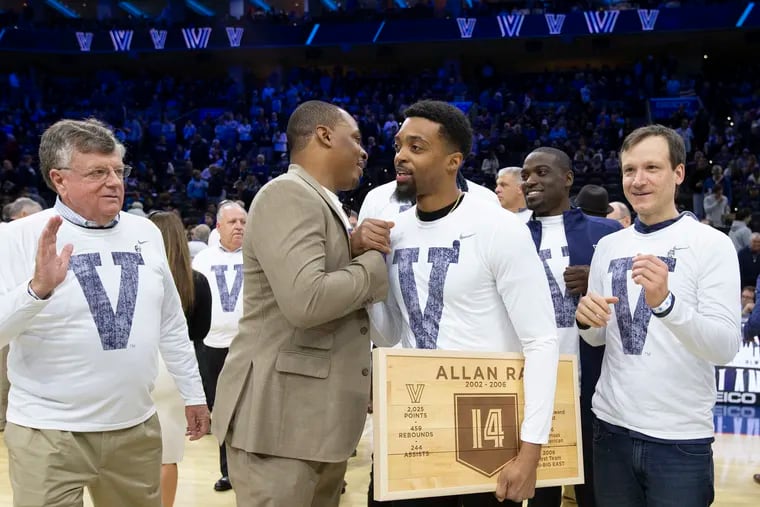 Allan Ray is congratulated by Randy Foye and other Villanova teammates after having his number retired in 2019.